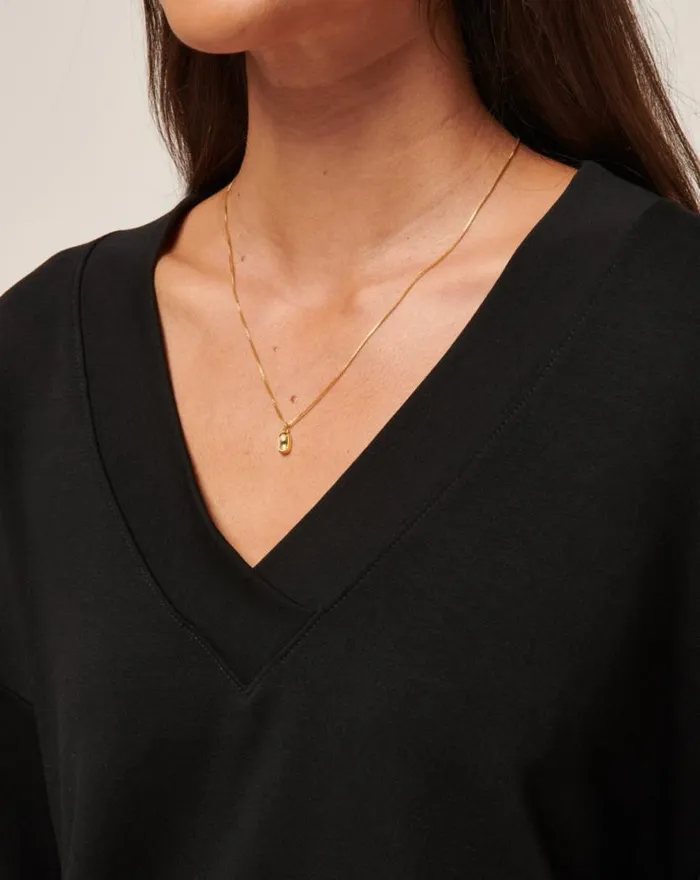 TravisMathew CLOUD TERRY VNECK TOP Black Women Shirts and Tops