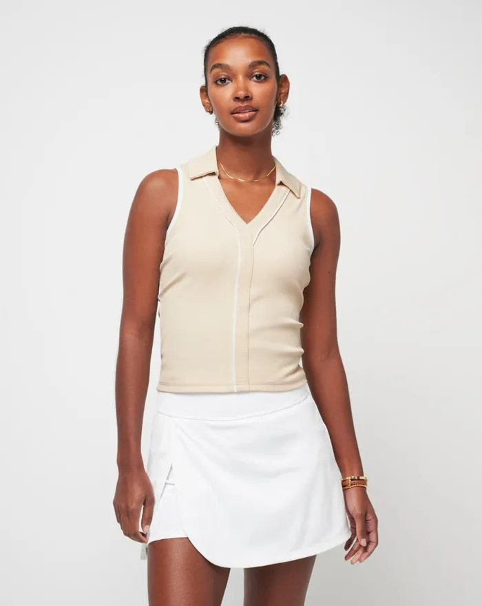 TravisMathew SIP AND SEA MOVEKNIT SLEEVELESS POLO Brazilian Sand Women Polos TravisMathew SIP AND SEA MOVEKNIT SLEEVELESS POLO Brazilian Sand Women Polos