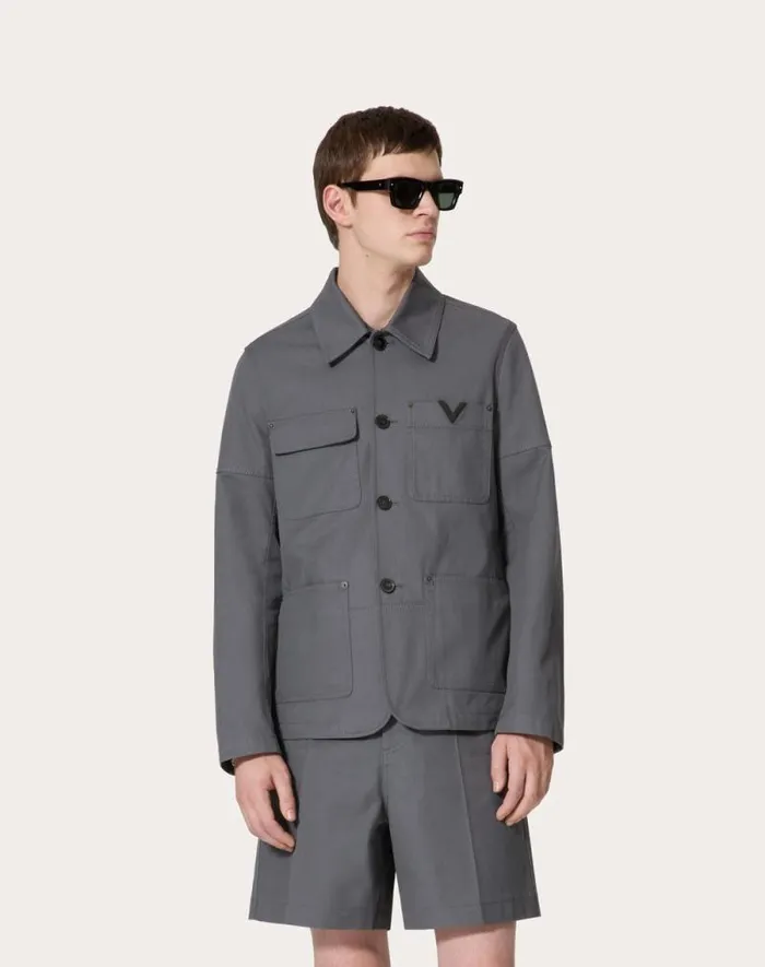 Valentino Outerwear Man Stretch Cotton Canvas Jacket With Metallic V Detail For Man In Light Grey Light Grey Valentino Outerwear Man Stretch Cotton Canvas Jacket With Metallic V Detail For Man In Light Grey Light Grey