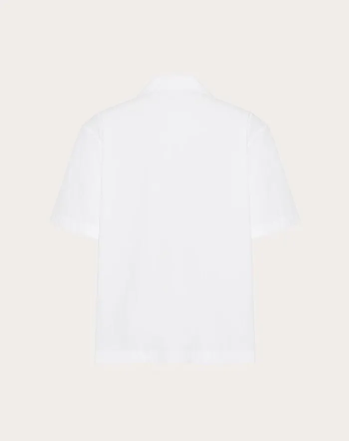 Valentino Shirts Man Cotton Poplin Bowling Shirt With Rubberized V Detail For Man In White White Valentino Shirts Man Cotton Poplin Bowling Shirt With Rubberized V Detail For Man In White White