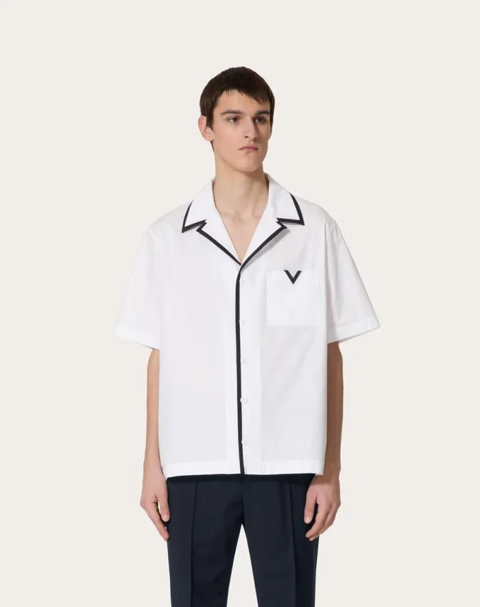 Valentino Shirts Man Cotton Poplin Bowling Shirt With Rubberized V Detail For Man In White White Valentino Shirts Man Cotton Poplin Bowling Shirt With Rubberized V Detail For Man In White White