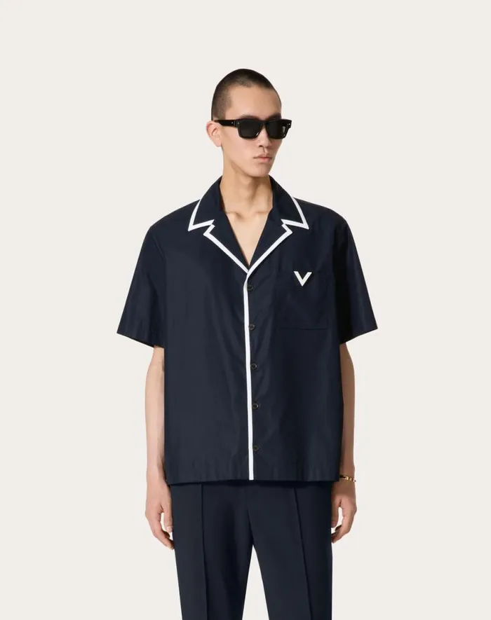 Valentino Shirts Man Cotton Poplin Bowling Shirt With Rubberized V Detail For Man In White White Valentino Shirts Man Cotton Poplin Bowling Shirt With Rubberized V Detail For Man In White White