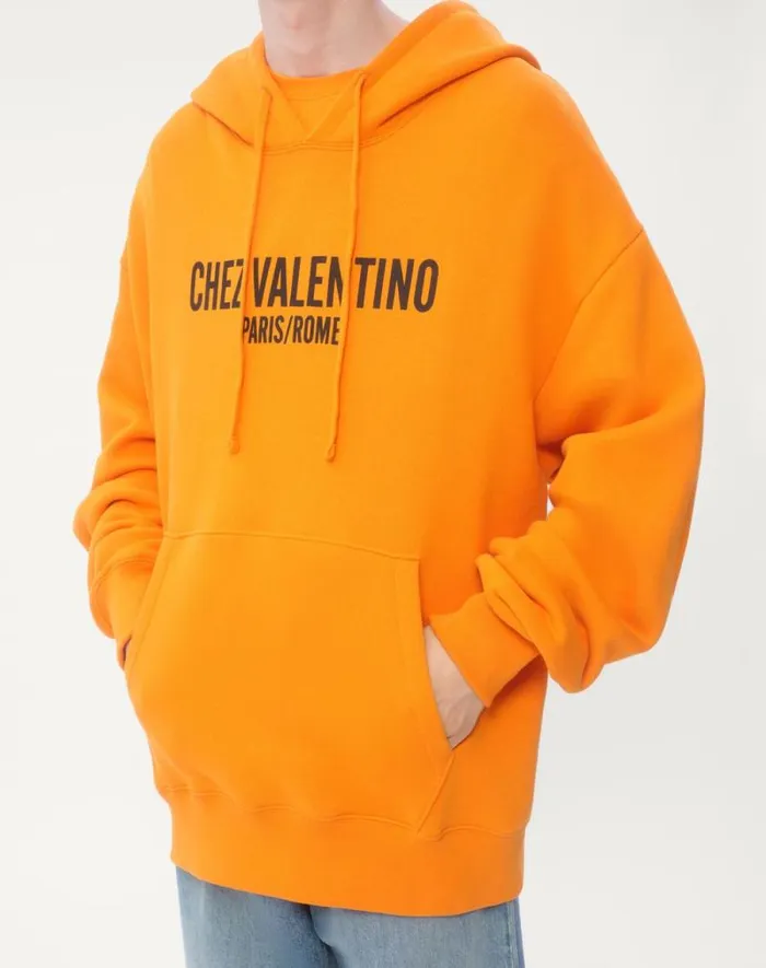 Valentino Tshirts And Sweatshirts Man Cotton Hooded Sweatshirt With Chez Valentino Print For Man In Orange Orange Valentino Tshirts And Sweatshirts Man Cotton Hooded Sweatshirt With Chez Valentino Print For Man In Orange Orange