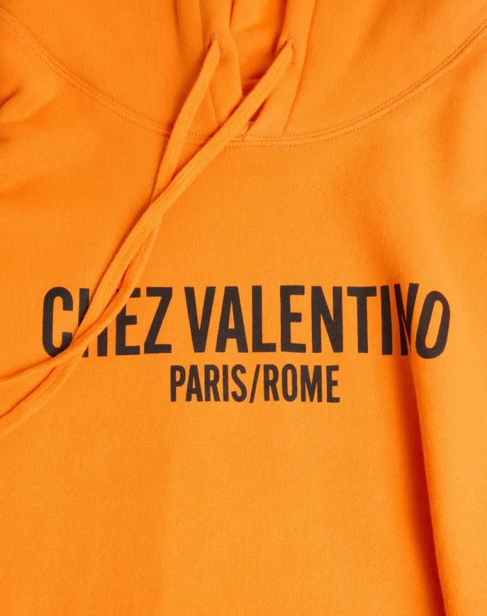 Valentino Tshirts And Sweatshirts Man Cotton Hooded Sweatshirt With Chez Valentino Print For Man In Orange Orange Valentino Tshirts And Sweatshirts Man Cotton Hooded Sweatshirt With Chez Valentino Print For Man In Orange Orange