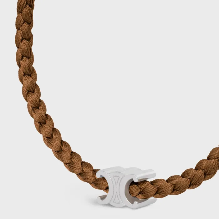 Triomphe Beach Bracelet In Silk And Brass With Rhodium Finish Tan Silver Men CELINE BRACELETS and RINGS Triomphe Beach Bracelet In Silk And Brass With Rhodium Finish Tan Silver Men CELINE BRACELETS and RINGS